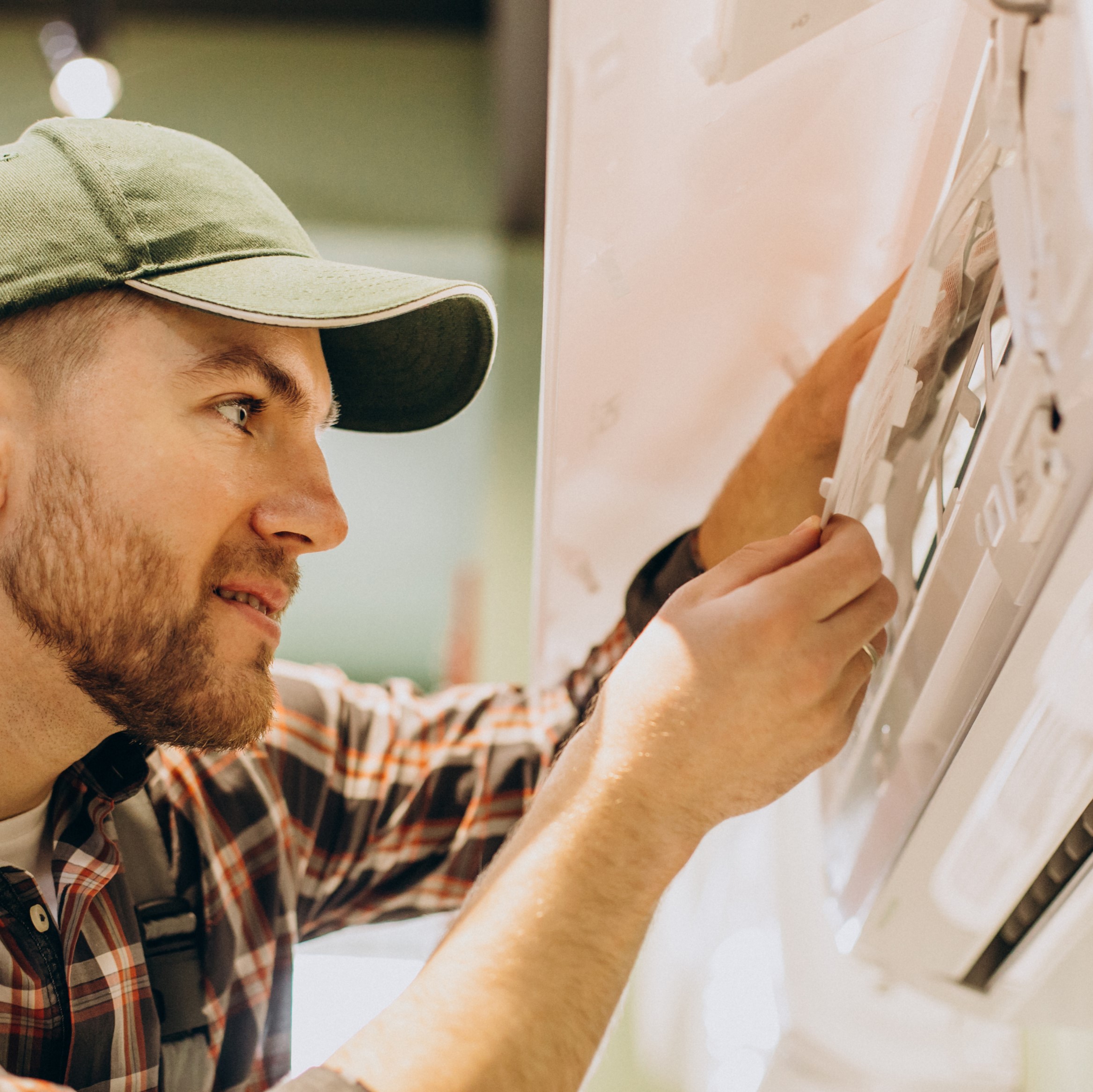 Handyman working on an AC unit