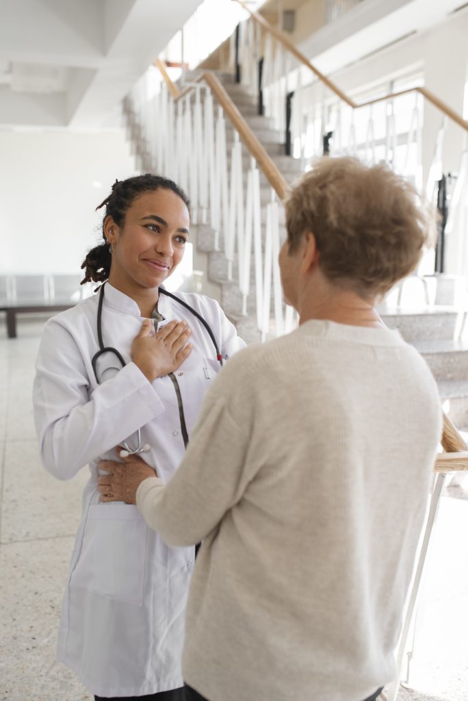 Patient thanking a woman doctor